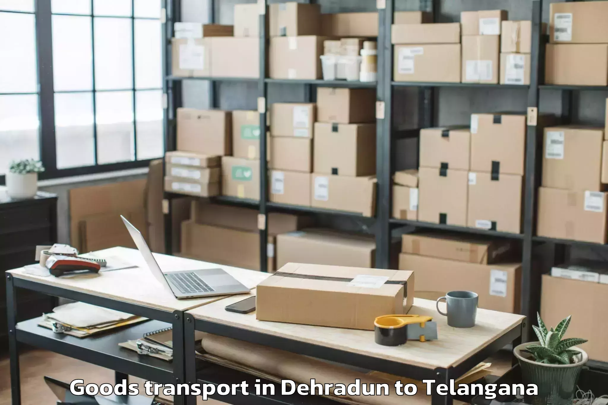 Professional Dehradun to Palwancha Goods Transport